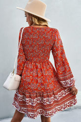 Robe bohème à col en V et manches ballon